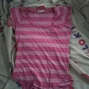 Im selling a pink shirt with white strips.
